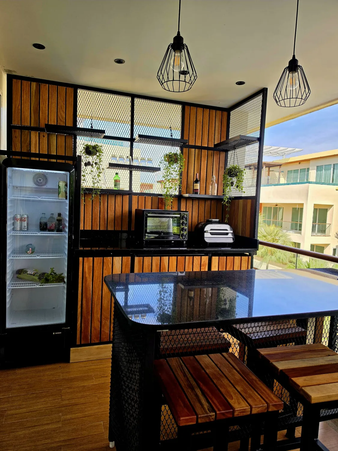 Covered kitchen and dining area on the terrace
